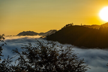 Hills among the clouds in early morning