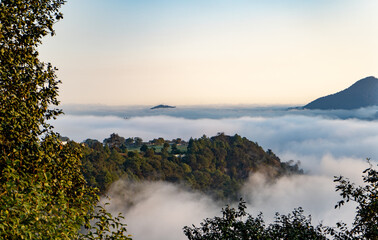 Small village in the hill among the clouds