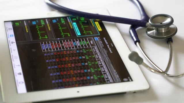 Medical vital signs monitor in mobile application. Selective focus.