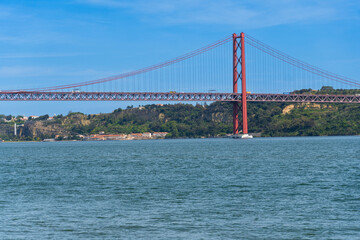 The 25th April Bridge, Ponte 25 de Abril in Portuguese, the longest suspension bridge in Europe. Connecting the city of Lisbon, capital of Portugal, to the municipality of Almada over the Tagus River.