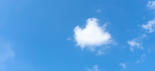 Beautiful blue sky with strange shape of clouds in the morning or evening used as natural background texture in decorative art work.