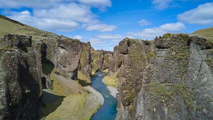 the fascinating landscape of Iceland with a canyon and a river, photos from a drone