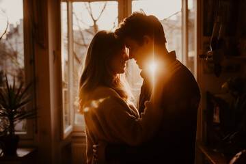 young couple at home in morning. Hugging, Valentine's Day