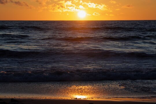 SUNSET ON THE BEACH
