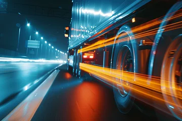 Semi-truck moving on a highway at night with motion blur and light trails, representing transportation and logistics