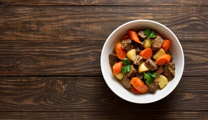 Beef meat stewed with potatoes, carrots and spices