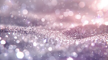 Glitter background in pastel delicate silver and white tones de-focused.