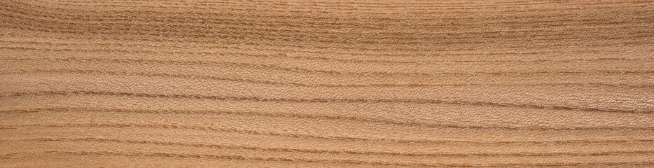 Soft elm veneer with a flowing, wavy grain pattern