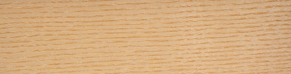 Olive ash veneer showcasing unique grain patterns and warm hues