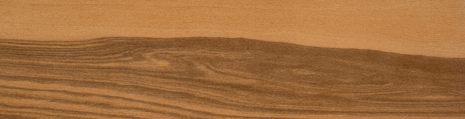 Sliced olive tree veneer with captivating grain and rich color variations