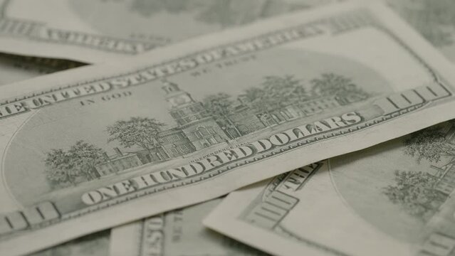 Closeup slide background of 100 dollar bills old style