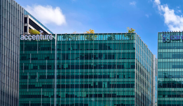 Bonifacio Global City, Taguig, Metro Manila - May 24, 2024: Accenture and other modern office buildings part of Uptown mall