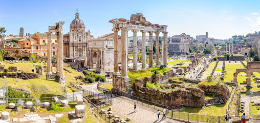 Rome, Italy - April 09, 2024: View of the roman forum in Rome with tourists crowding its...