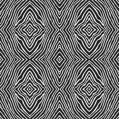 Obraz premium Vector ikat seamless pattern from black and white wavy stripes, zebra skin prints 