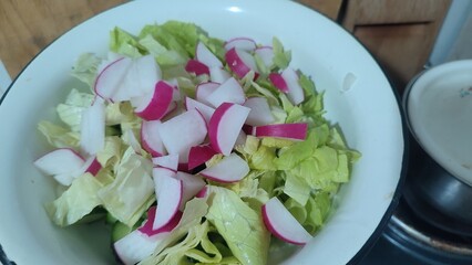 food fresh salad with radish, green onions 