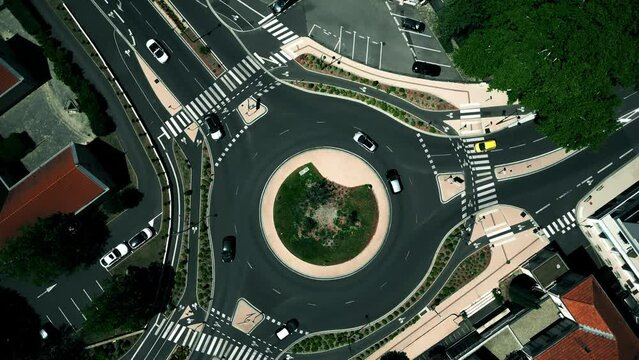 Aerial overhead view of a three way urban roundabout. Montelimar, France
