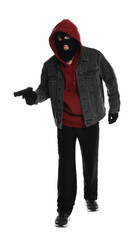 Thief in balaclava with gun on white background