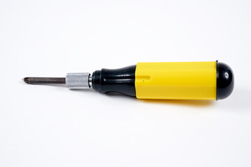 black and yellow screwdriver on white background