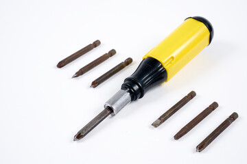 black and yellow screwdriver on white background