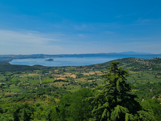 Fototapeta premium view from the top of the hill, lake and fields