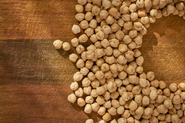 Raw, organic nuts on a wooden surface. Nut add.