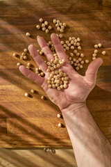 Raw, organic nuts on a wooden surface. Nut add.
