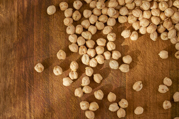Raw, organic nuts on a wooden surface. Nut add.