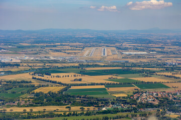 Forward cockpit view of runway at Rome Fiumicino airport in Italy