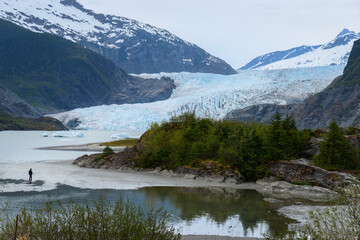 Tourist visiting Mendenhall Glacier. Juneau. Alaska.
