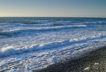 sea ​​foam on the waves of the Mediterranean sea on a summer evening 2
