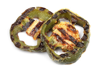Slices of grilled green chili pepper isolated on white