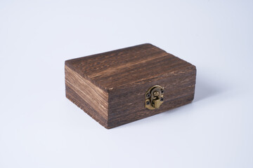 Handmade wooden gift box on a white isolated background.