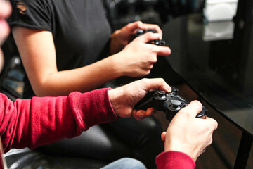 Man and Woman Engaged in Video Game Competition