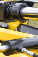 Black pistons or actuators in pneumatic or hydraulic machine. Technology