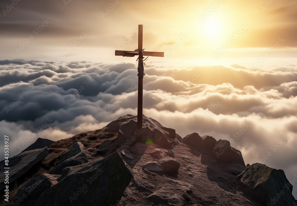 Wall mural Wooden cross on the top of the mountain with clouds on the background