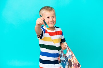 Little artist Russian boy over isolated background