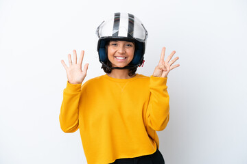 Woman with a motorcycle helmet counting nine with fingers