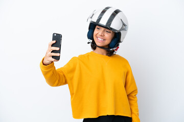 Woman with a motorcycle helmet making a selfie