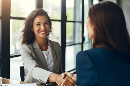 Professional Partnership: Smiling Female Executive Shakes Hands with Client, Successful Deal in Office, Mid-aged Manager Greets Client, Secures , blurred background, Successful Deal with Handshake