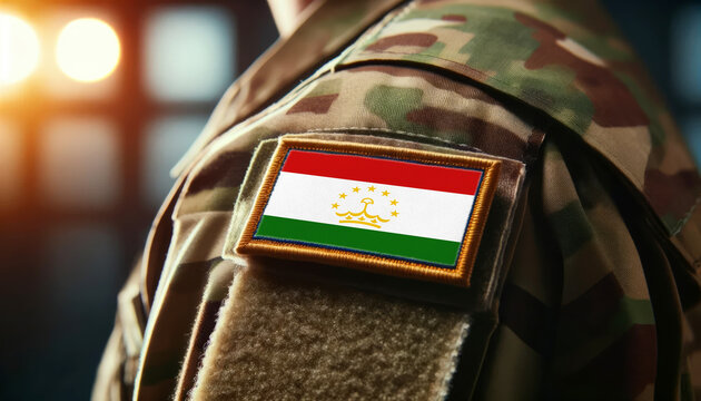 A soldier's uniform with the Tajikistan flag patch, symbolizing patriotism and service to the nation