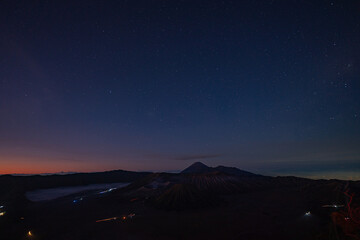 Aerial view colorful sky at twilight above the horizon..Amazing View from the top of the mountain Pennajagan view point to see Bromo volcanoes. Destination of tourists coming to Indonesia.