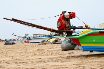 Obraz premium Fishing boat and net in the beach
