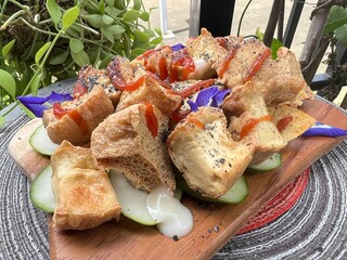 Fried tofu mixed sesame with tomato sauce