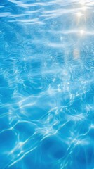 Obraz premium Ocean blue water surface with bright sun light reflections swimming backgrounds underwater.
