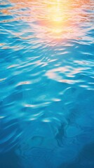 Obraz premium Ocean blue water surface with bright sun light reflections swimming backgrounds abstract.