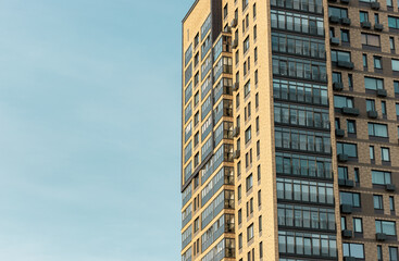 Fototapeta premium Invest in modern urban condos and skyscrapers. Architectural designs with large windows and futuristic facades. Ideal for real estate investment and business themes.