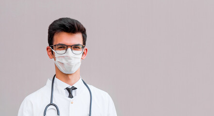 Stay home for us. Photo of family doctor guy examining patients virologist outbreak wear protective mask white lab coat black neck tie isolated grey color background