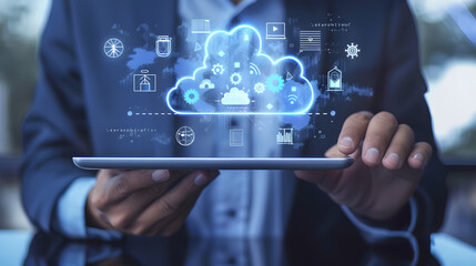 Fototapeta premium A businessman is using his tablet to access the cloud storage system. with digital graphs and icons floating above it 