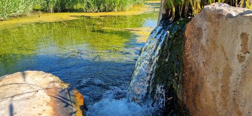 water flowing into the river