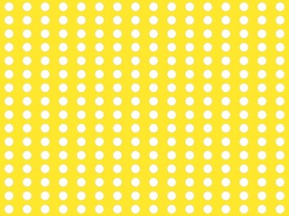 a yellow and white polka dot pattern background  © Pupun